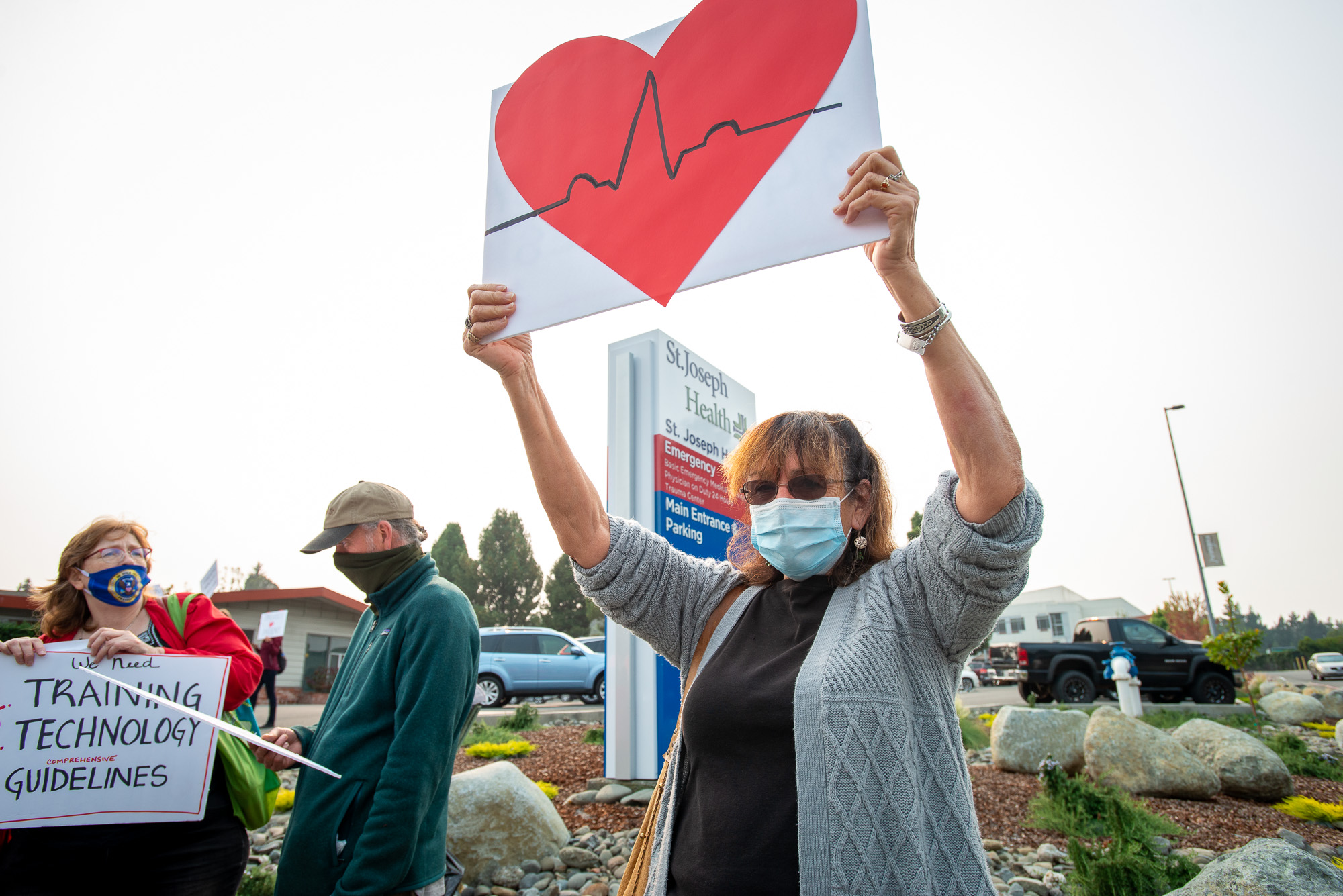 Ginger Sotelo, retired St. Joes charge nurse on medical surgical floor 2 joined with other nurses to picket hospital administration on Monday.