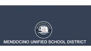 blue background with white writing 'mendocino unified school district' with the round logo about with white open book in center of logo