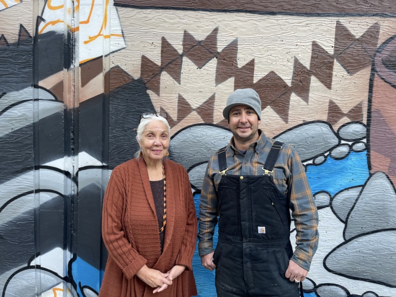 Previous muralist Deborah McConnell and new mural artist Carl Avery