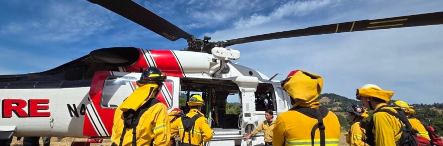 Firefighters learn about working with Cal Fire aircraft at Sunday's Wildland Readiness Drill in Southern Humboldt.