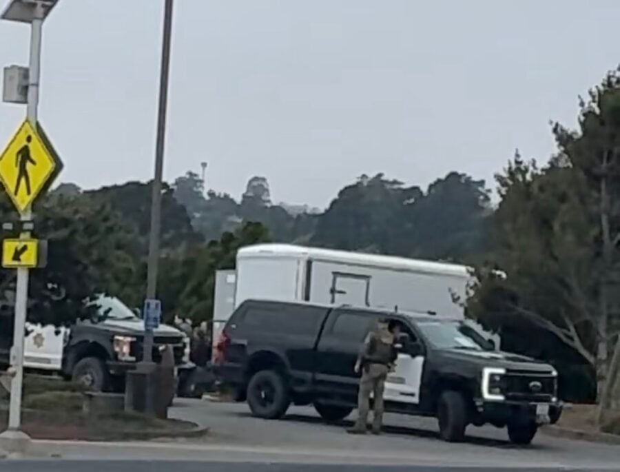 Law enforcement officers gather Tuesday morning at the River Lodge in Fortuna for a briefing before convoying to Miranda's Rescue, where the Humboldt County Sheriff's Office later executed a search warrant as part of its ongoing investigation. Photo: Courtesy of Jenna Moore.