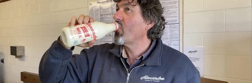 Blake Alexandre, co-founder of Alexandre Family Farm, seen here in a frame from a California state agency promotional video. [Video by California Department of Food and Agriculture video.]