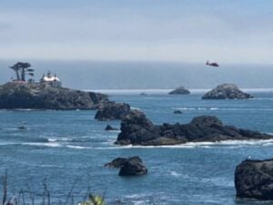 helicopter off rocky shore of crescent city