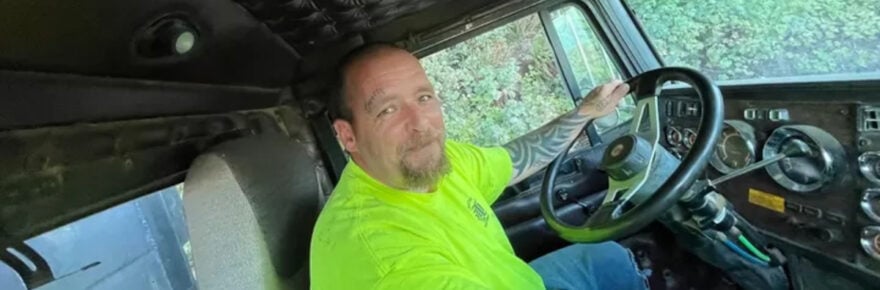 Truck driver in a green shirt