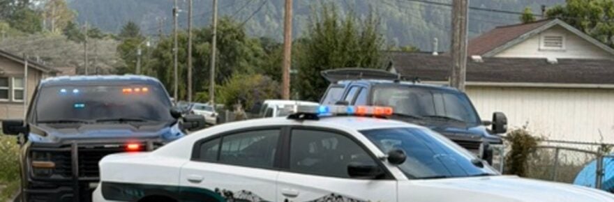 rio dell patrol car with black hcso pickups with light bars in grill in windows.