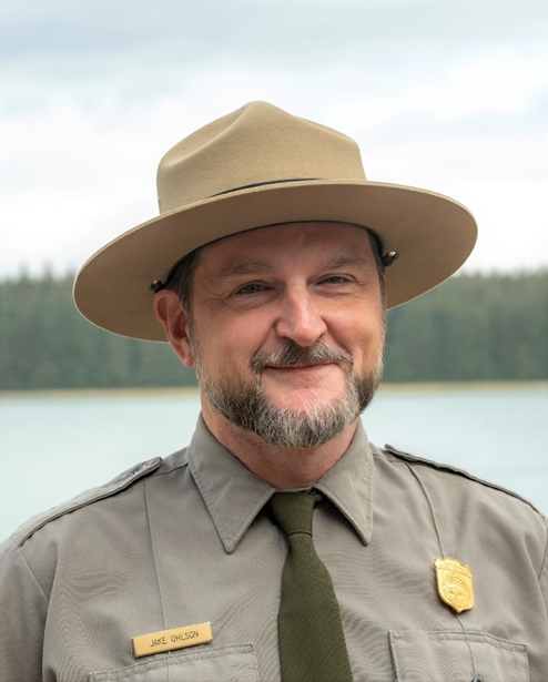 Park Ranger smiles for a headshot